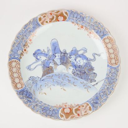 A Japanese 20th Century Large Blue And White And Red-Enamelled And Gilt-Decorated 'Floral' Fluted-Rim Dish (Ji Stamp)