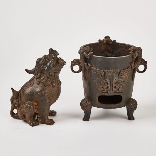 A Chinese Iron Cast 'Auspicious Beast' Ornament and A Chinese Iron Cast Tripod Stove