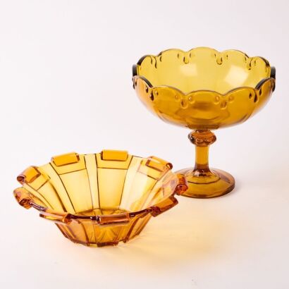 A Pair of Amber Glass Bowls