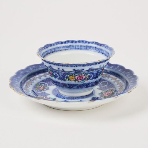 A Set of Chinese Qing Dynasty Qianlong Year Blue and White Famille-Rose 'Floral' Lobed Cup and Stand