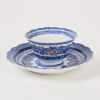 A Set of Chinese Qing Dynasty Qianlong Year Blue and White Famille-Rose 'Floral' Lobed Cup and Stand