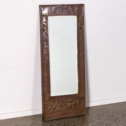 An Arts And Crafts Beaten Copper Mirror