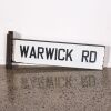 A Vintage New Zealand Porcelain Steel Road Sign, 'Warwick Road'