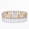 18ct White Gold, 2.14ct Fancy Yellow Diamond / 3.39ct Diamond Bracelet