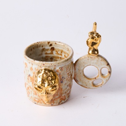 A Quirky Laurie Steer Alien Mug Giving the Fingers in a Shino Glaze