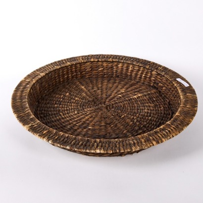 A Large Round Rattan Serving Tray
