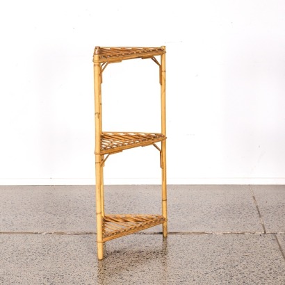 A Three Tier Shelved Cane Corner Unit