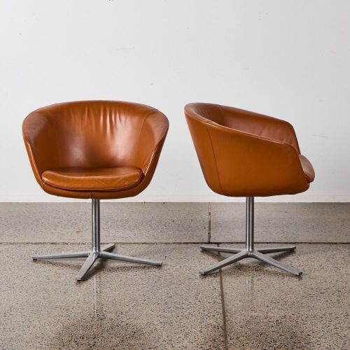 A Pair Of Leather Bob Swivel Guest Chairs By Pearson Lloyd For Coalesse