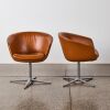 A Pair Of Leather Bob Swivel Guest Chairs By Pearson Lloyd For Coalesse