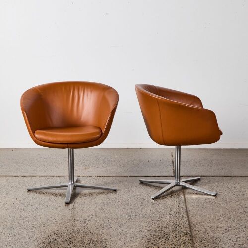 A Pair Of Leather Bob Swivel Guest Chairs By Pearson Lloyd For Coalesse AF