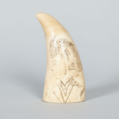 A Scrimshaw Whale's Tooth