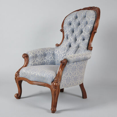 An Antique Grandfather Chair Upholstered in Blue and White