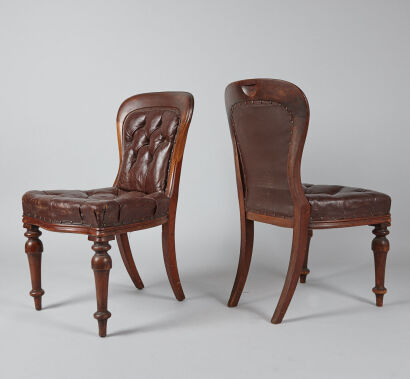 A Set of Six Leather Button Back Dining Chairs 