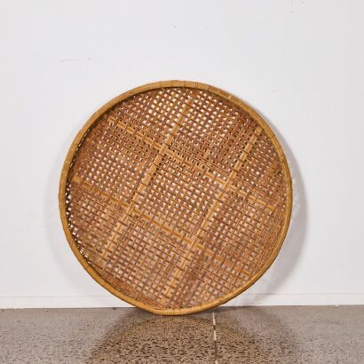 A Mid Century Oversized Woven Bamboo Serving Tray or Gathering Basket