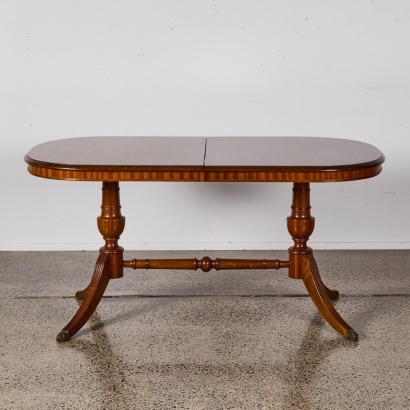 An Antique Extendable Dining Table