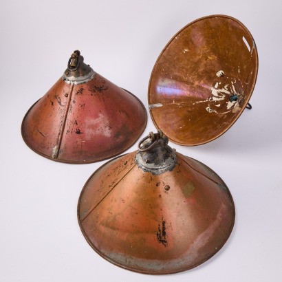A Trio Of Copper Factory Lamps