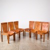 A Set Of Six Brutalist Seventies Rosewood And Leather Dining Chairs