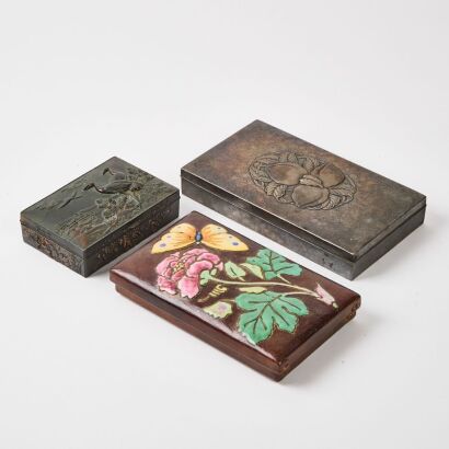 A Japanese Meiji Period Cloisonne Enamel ‘Flowers And Butterflies’ Box And A Japanese Meiji Period Sterling Silver ‘Peach’ Box And A Japanese Metal ‘Crane’ Box