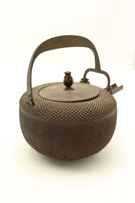 A Japanese Meiji Period Iron Cast Teapot