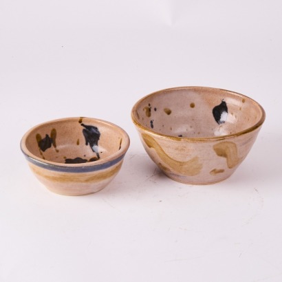 A Pair Of Glazed Pottery Bowls