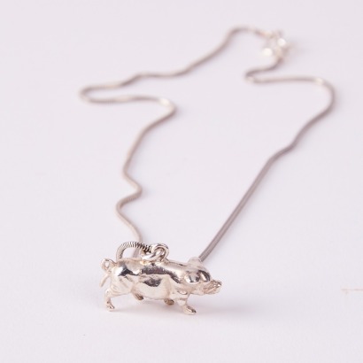 A Sterling Silver Pig on a Sterling Silver Rope Chain