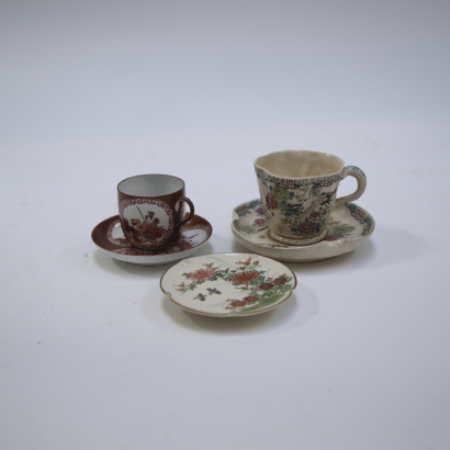 A Japanese Satsuma Ware Cup and Saucer AND A Kutani Cup and Saucer AND A Satsuma Ware Small Plate