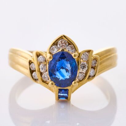 18ct Yellow Gold, .68ct Blue Sapphire /.16ct Diamond Cluster Ring