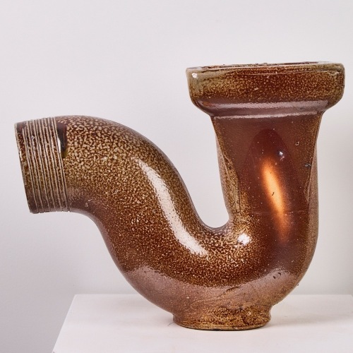 A Crum New Lynn Brickworks 'U' Bend Pipe