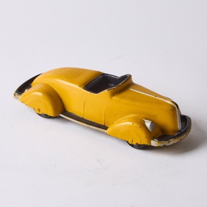 A Vintage Tootsie Toy Boattail Roadster