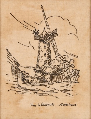 A Framed Embroidery of a Windmill