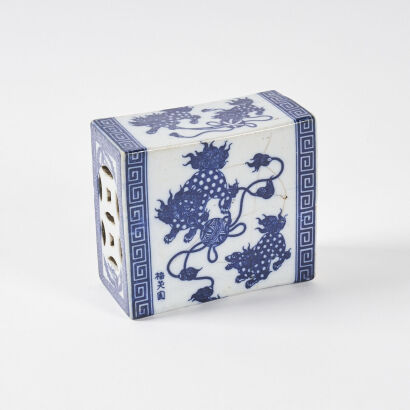 A Chinese Late Qing-Dynasty Blue and White 'Lion' Wrist Pillow