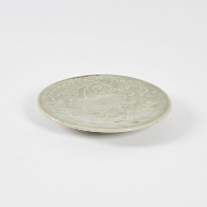 A Small Chinese 19th Century Celadon Carved Saucer