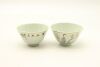 A Pair of Chinese 20th Century painted Figural Teacups (Huang Fu Chang Produced)