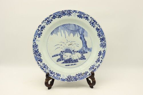 A Chinese Qing Dynasty Kangxi Year Blue and White 'Twin Rabbits' Charger (Damaged)