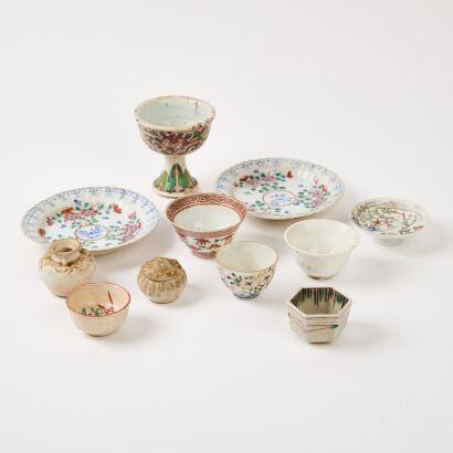 A Group Of Twelve Famillie-Rose Small ’Flower’ Dishes And Cups