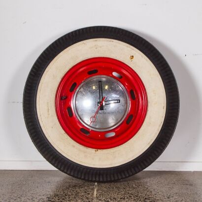 A Vintage Firestone Wheel Clock