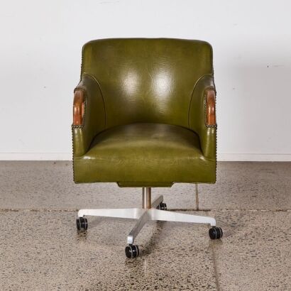 A Green Vinyl Swivel Chair