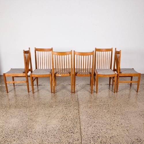 A Suit Of Six Refined Mid-Century Teak Dining Chairs