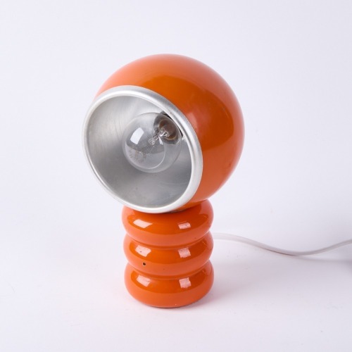 An Orange Magnetic Space Age Style Lamp