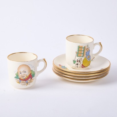 A Pair Of Crown Lynn Nursery Cups And Four Saucers