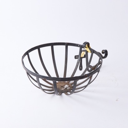 A Set of Four Iron Planter Hangers