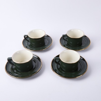 A Set of Four Green Cups and Saucers
