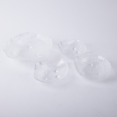 A Set of Four Glass Seashell Bowls