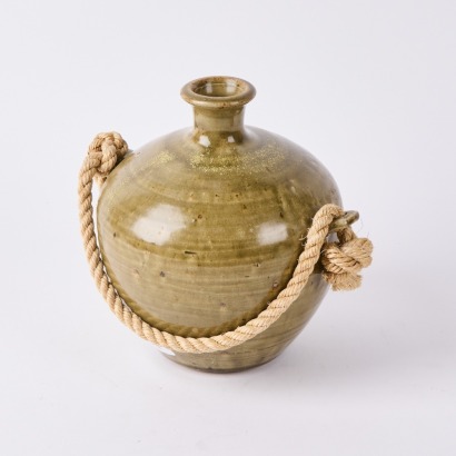An Glazed Earthen Decanter with a Rope Handle