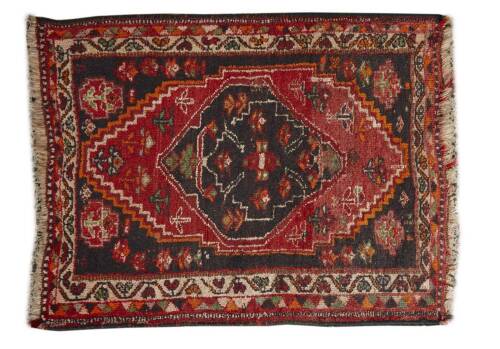 A Small Hand Knotted Carpet