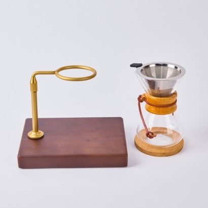 A Drip Filter Coffee Maker and Stand