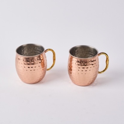 A Pair of Godinger Beaten Copper Mugs