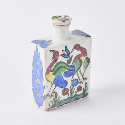 A Ceramic Bottle and Stopper with Bird Motif