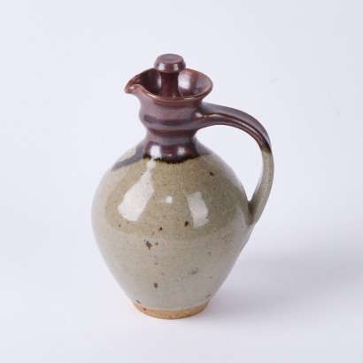 A Michael Block Red Lidded Jug