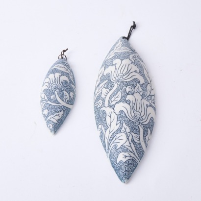 A Pair of Shim & Lee Ceramic Wall Forms